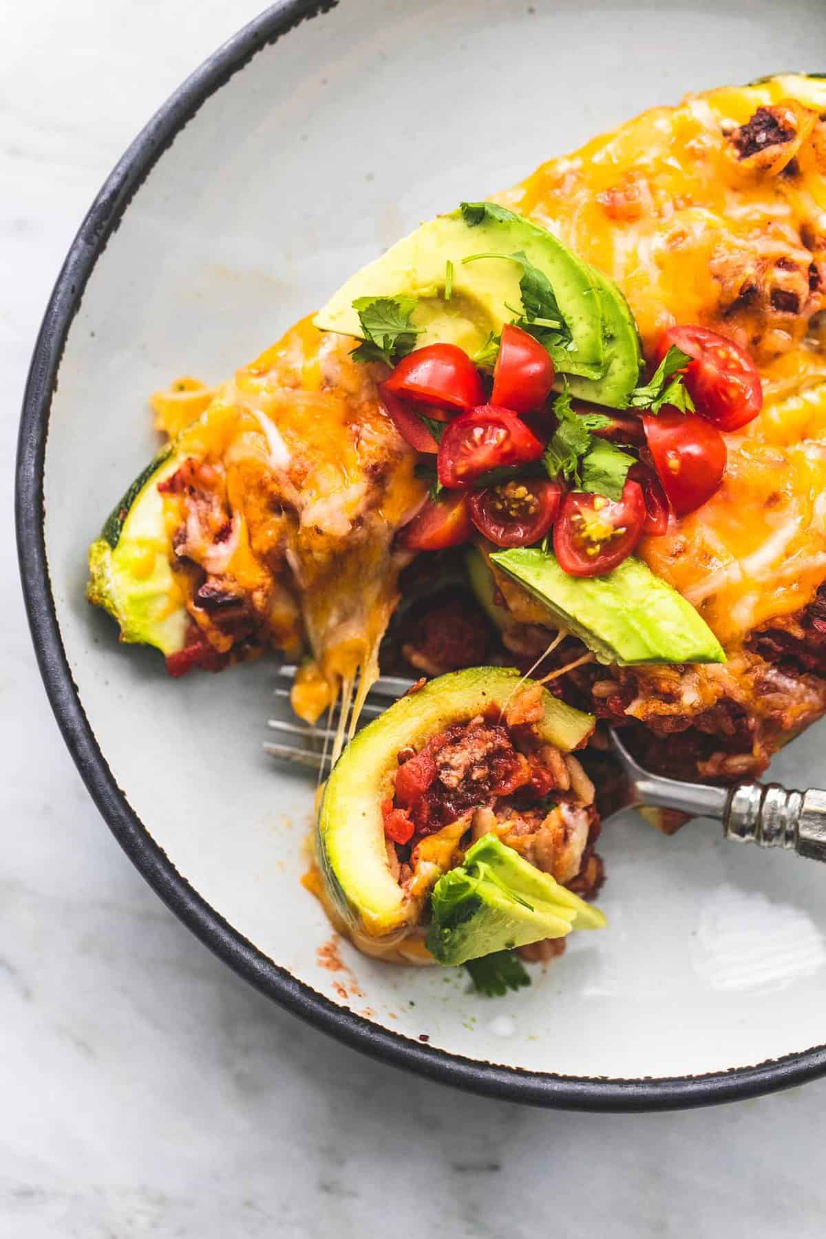 Easy Taco Stuffed Zucchini Boats healthy dinner recipe | lecremedelacrumb.com