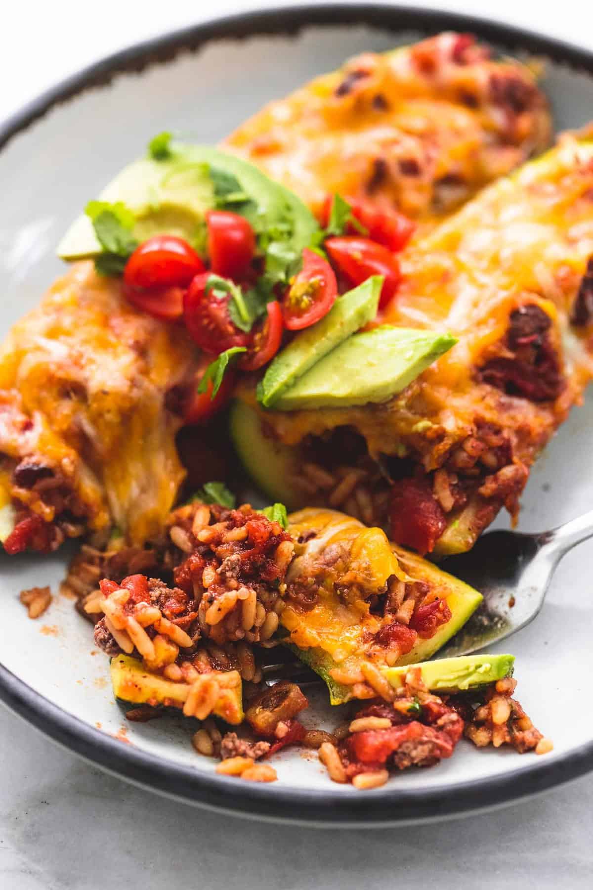 Easy Taco Stuffed Zucchini Boats healthy dinner recipe | lecremedelacrumb.com