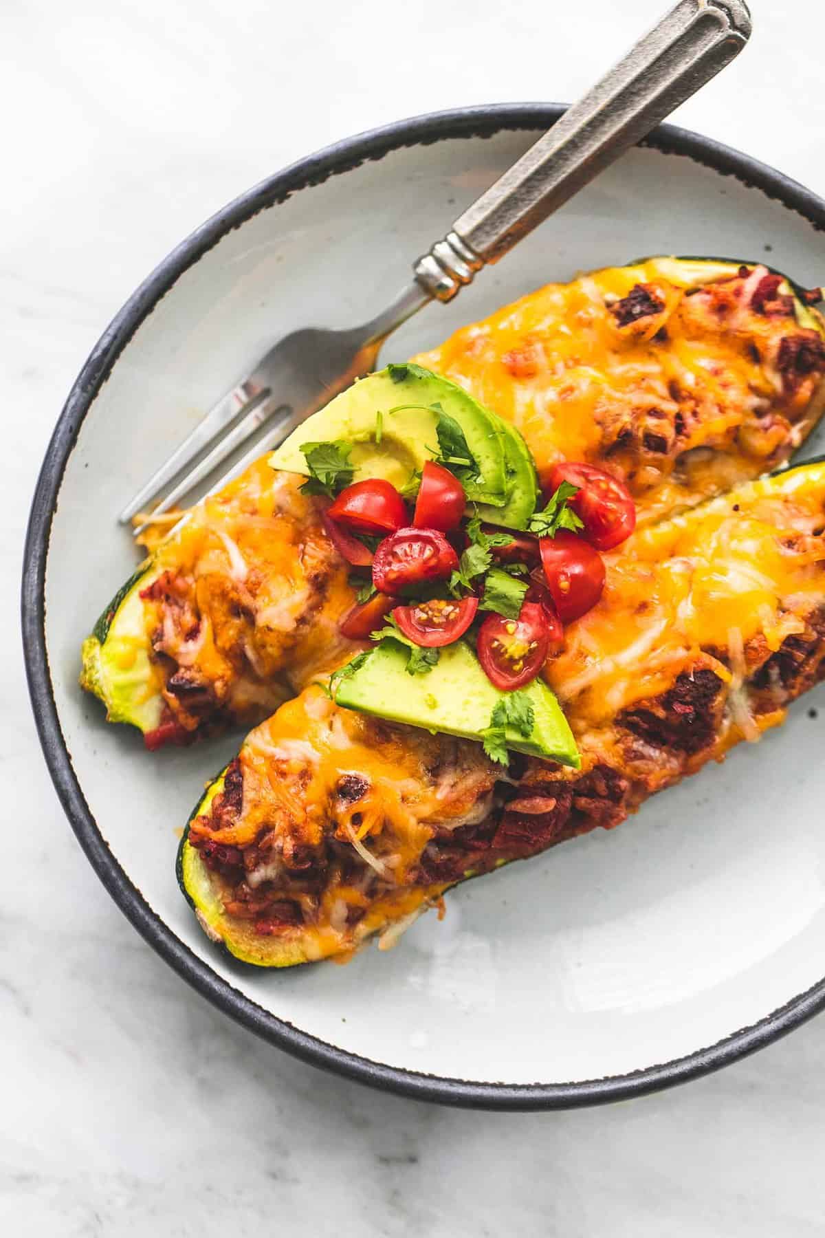 Easy Taco Stuffed Zucchini Boats healthy dinner recipe | lecremedelacrumb.com